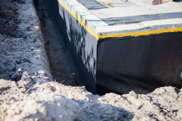 Professional Basement Waterproofing technician working in Combined Locks, WI